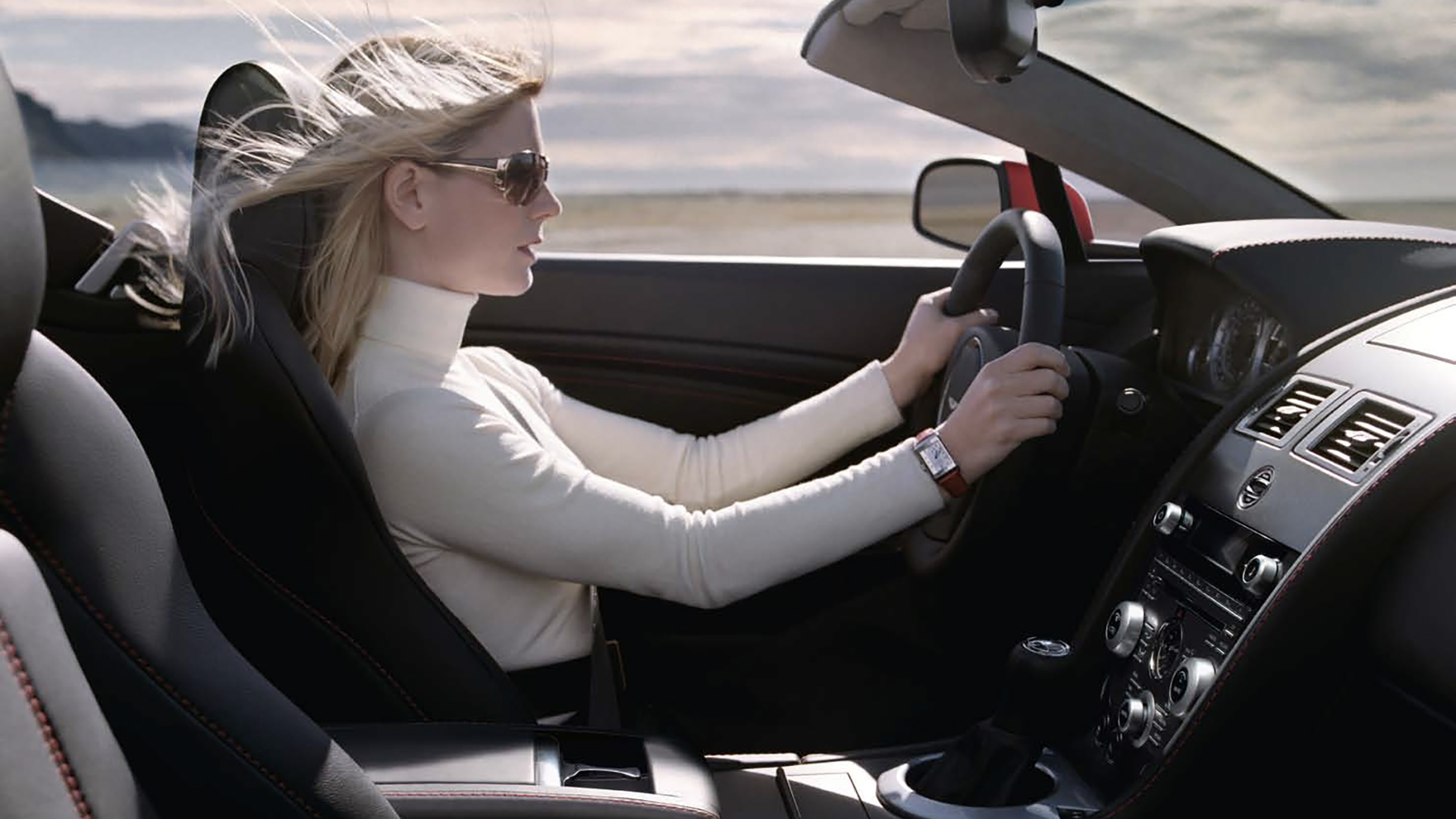 2008-aston-martin-v8-vantage-coupe-woman-car-back-catalogue-1