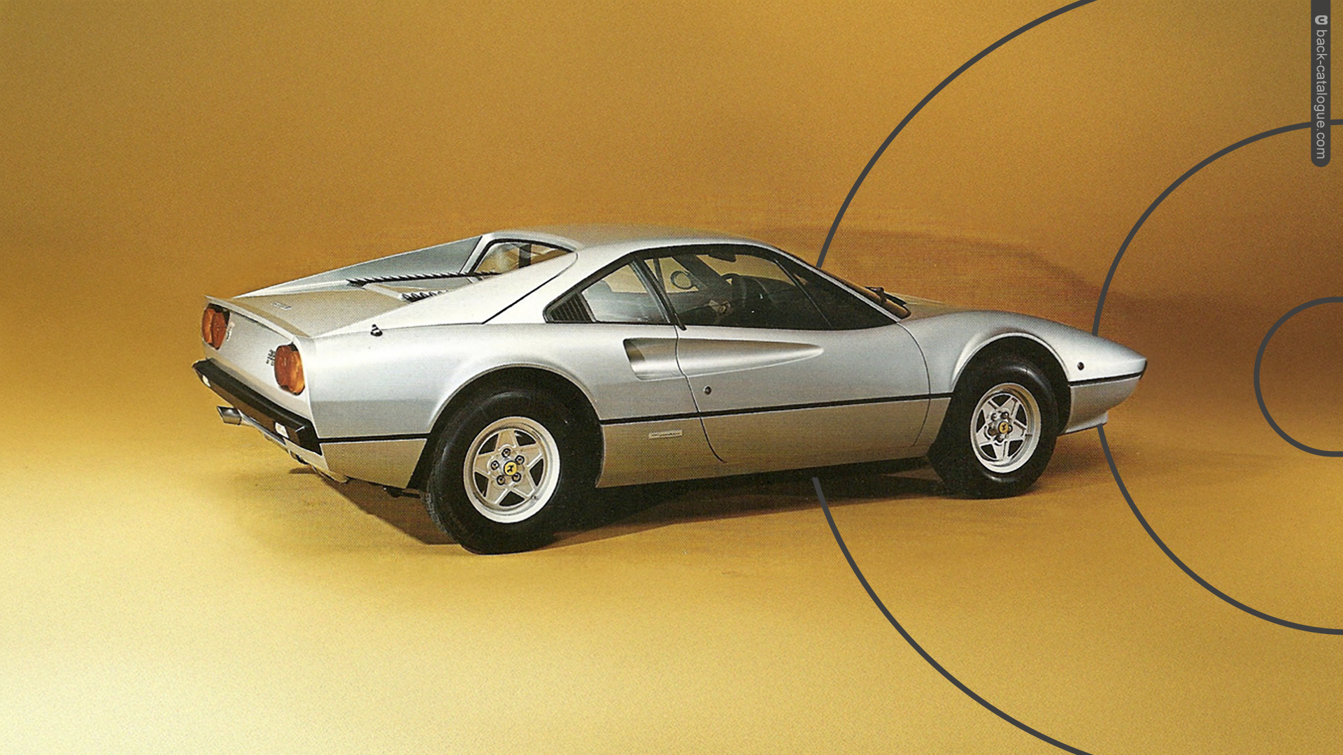 1976-ferrari-308-GTB-silver-rear-qtr-car-back-catalogue