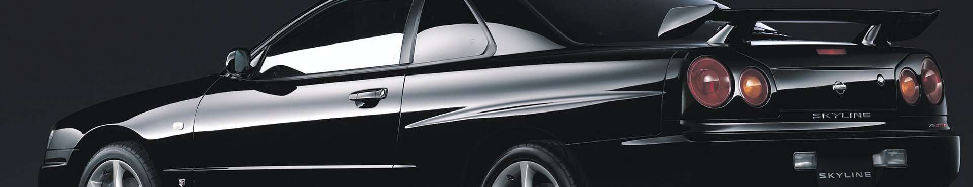 2000-nissan-skyline-gt-r-black-detail-1-car-back-catalogue-1