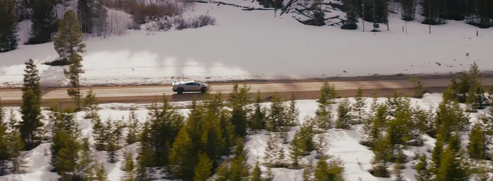 2025-tesla-cybertruck-snow-mountains-car-back-catalogue