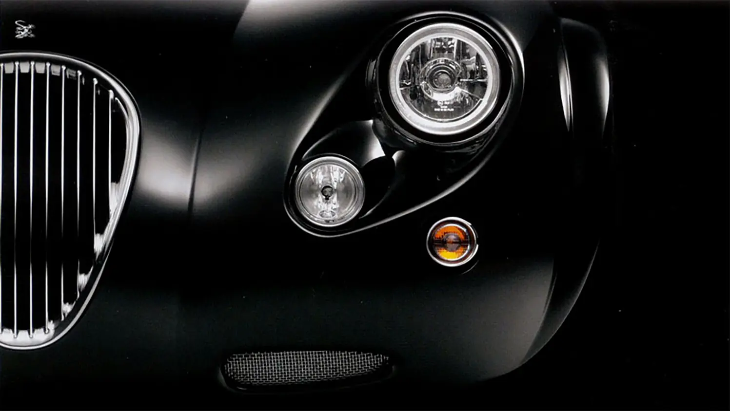 2009-wiesmann-roadster-mf3-front-detail-car-back-catalogue